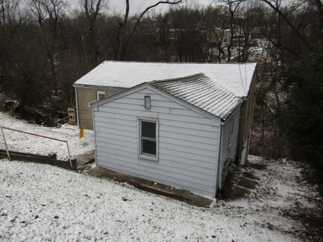 view of snow covered property