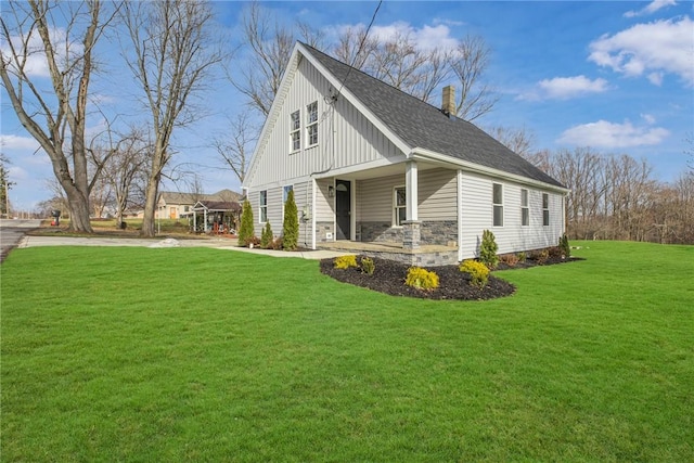 view of home's exterior with a lawn