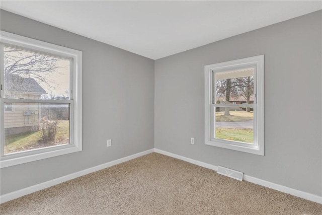 view of carpeted spare room