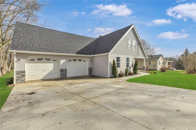 view of property exterior featuring a yard and a garage