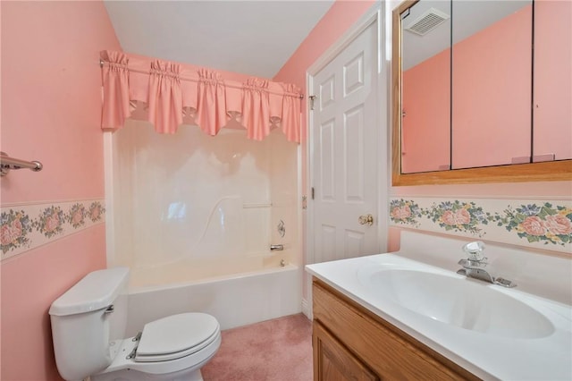 full bathroom with vanity, washtub / shower combination, and toilet