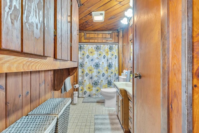 bathroom with toilet, wood walls, wooden ceiling, vanity, and a shower with shower curtain