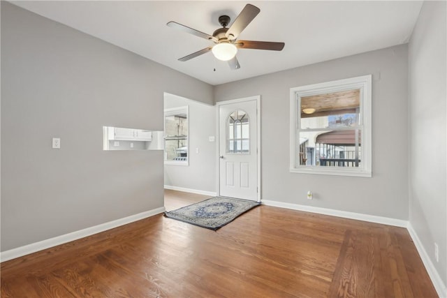 entrance foyer featuring wood-type flooring and ceiling fan