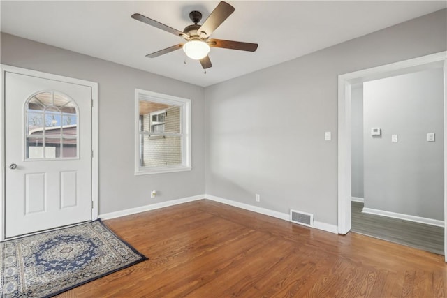 entrance foyer featuring hardwood / wood-style floors and ceiling fan