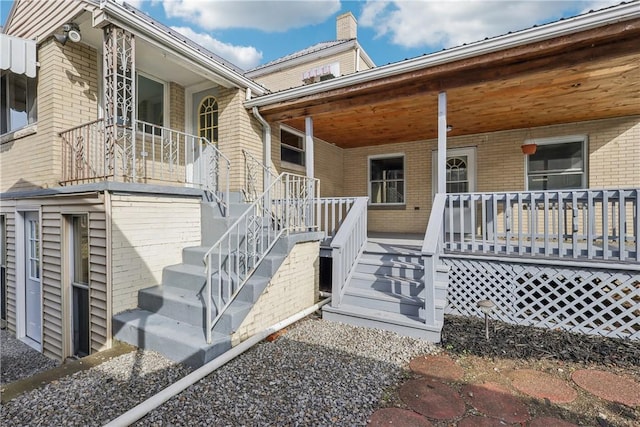 entrance to property with covered porch