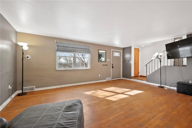 entryway with wood-type flooring