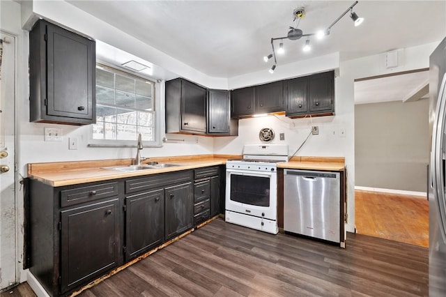 kitchen featuring dark wood-type flooring, butcher block counters, sink, stainless steel dishwasher, and white range