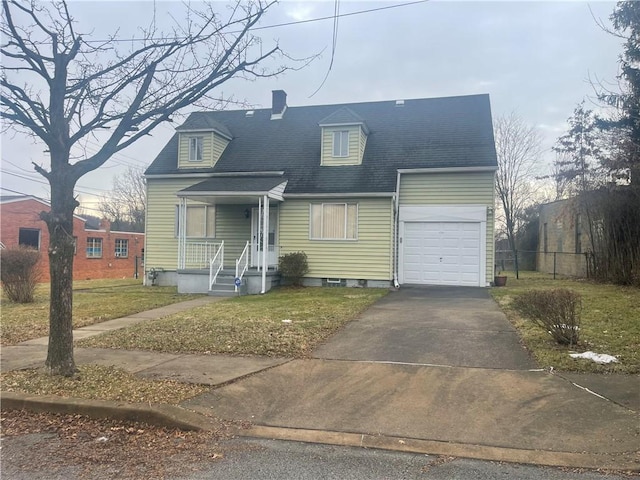 view of front facade featuring a garage and a front yard