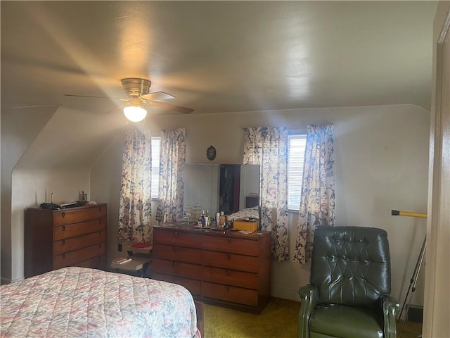 carpeted bedroom with lofted ceiling and ceiling fan