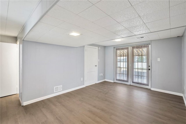 empty room featuring dark hardwood / wood-style floors