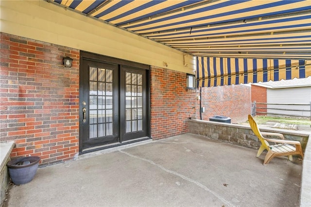 view of patio / terrace featuring french doors