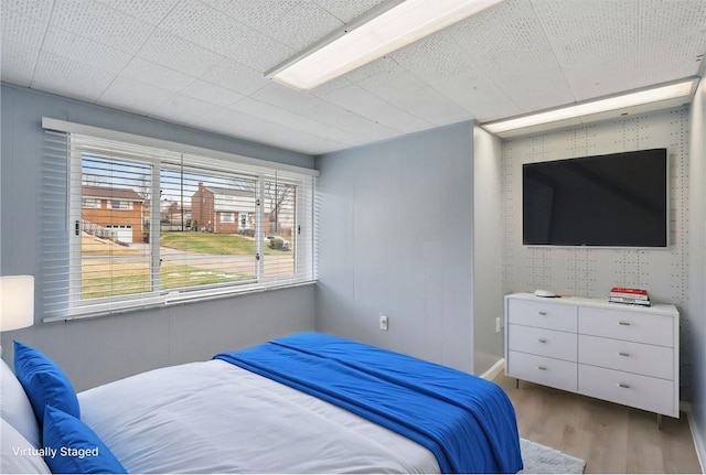 bedroom featuring hardwood / wood-style floors