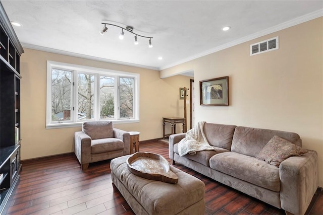 living room featuring dark hardwood / wood-style flooring and crown molding