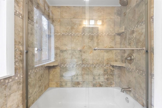 bathroom featuring enclosed tub / shower combo