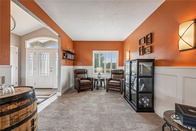 sitting room with light carpet