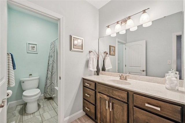 full bathroom featuring vanity, shower / tub combo, and toilet