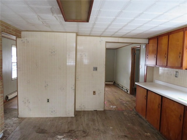 interior space featuring hardwood / wood-style flooring and a baseboard radiator