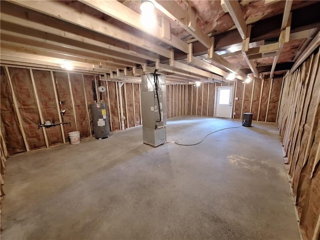 basement with heating unit and water heater