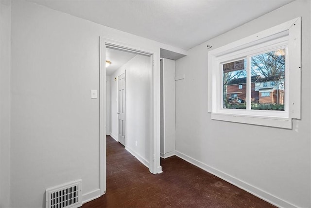 hall featuring dark hardwood / wood-style floors