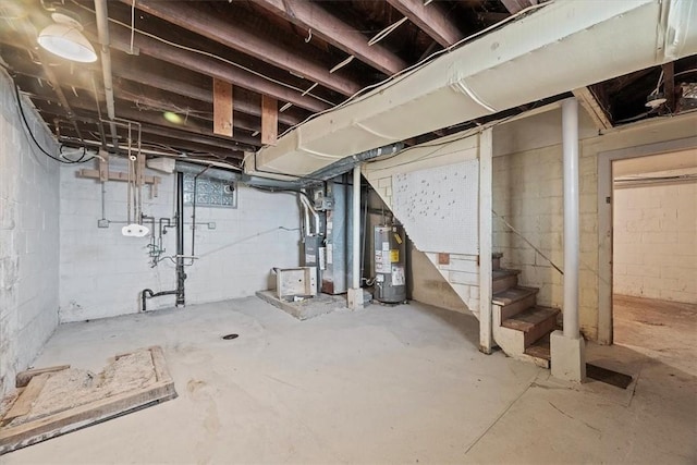 basement with heating unit and water heater