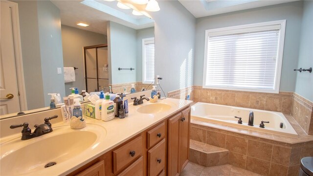 bathroom with vanity, tile patterned floors, and independent shower and bath