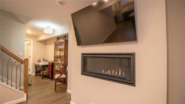 hallway featuring hardwood / wood-style flooring