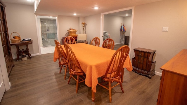 dining area featuring dark hardwood / wood-style flooring