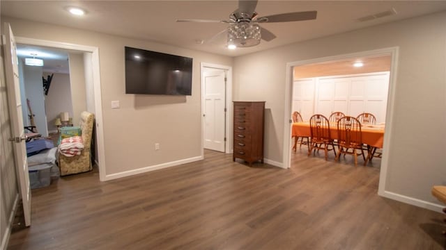 bedroom with dark wood-type flooring