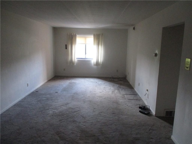 empty room featuring carpet floors