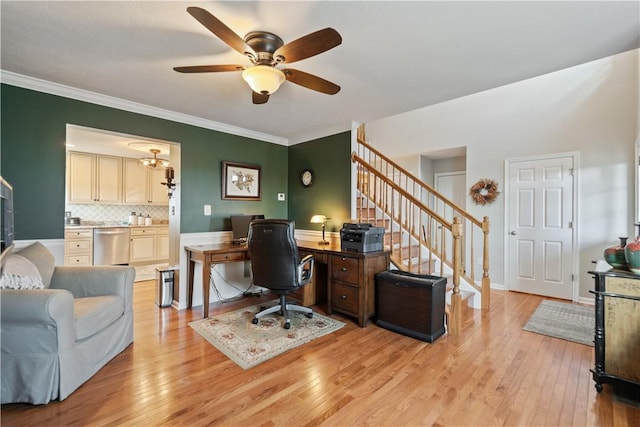 home office featuring ceiling fan, ornamental molding, and light hardwood / wood-style floors