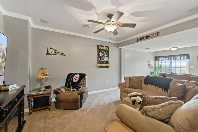 carpeted living room featuring ornamental molding and ceiling fan