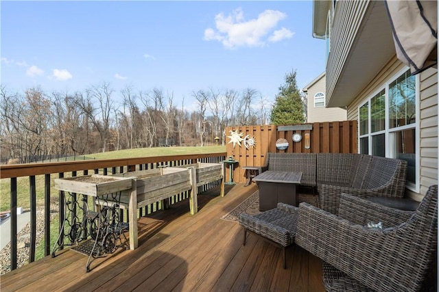 wooden deck featuring an outdoor hangout area