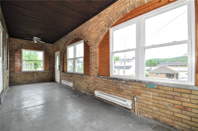 1036 7th St, West Elizabeth, PA 15088 - unfurnished sunroom featuring a baseboard radiator