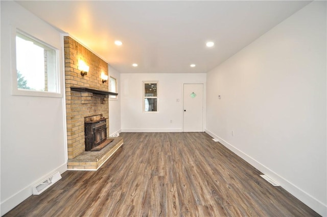 1036 7th St, West Elizabeth, PA 15088 - unfurnished living room featuring dark wood finished floors, recessed lighting, baseboards, and a fireplace