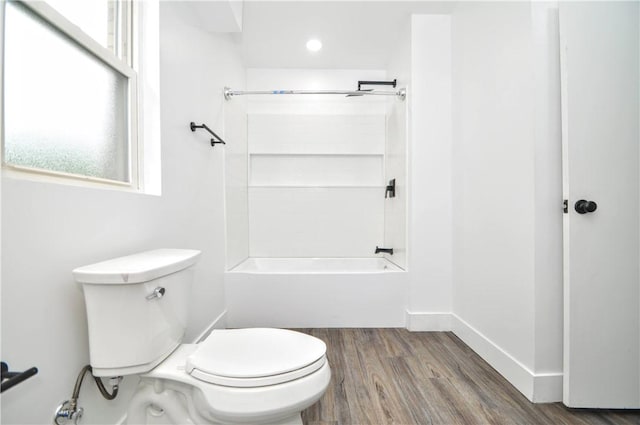 1036 7th St, West Elizabeth, PA 15088 - bathroom featuring toilet, shower / washtub combination, wood finished floors, and baseboards