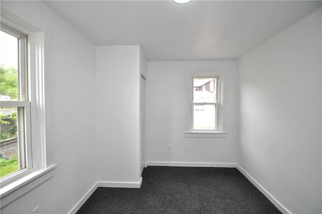 1036 7th St, West Elizabeth, PA 15088 - unfurnished room with dark colored carpet and baseboards
