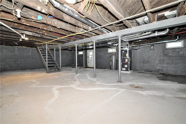 1036 7th St, West Elizabeth, PA 15088 - basement with stairway, heating unit, and water heater