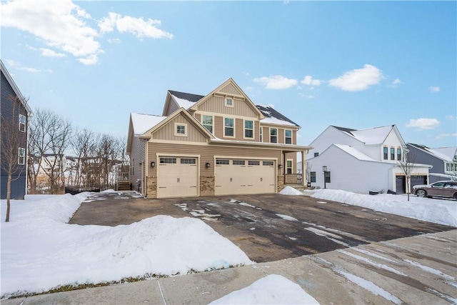 craftsman-style home with board and batten siding and an attached garage