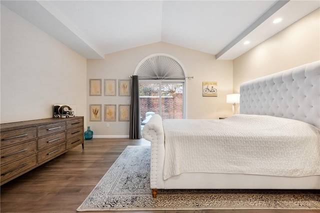 bedroom featuring dark hardwood / wood-style flooring and vaulted ceiling