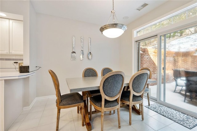 view of tiled dining space