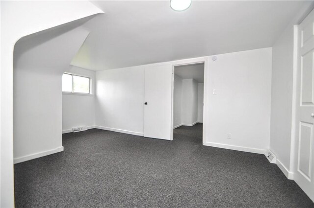 1036 7th St, West Elizabeth, PA 15088 - additional living space with dark carpet and baseboards