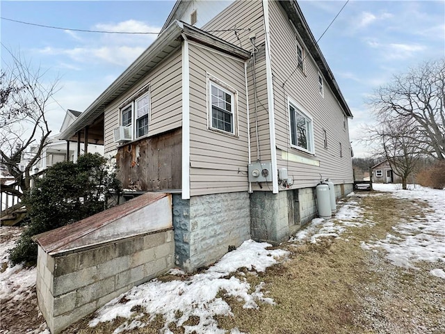 view of snow covered property