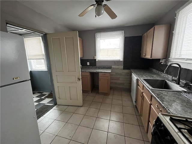 kitchen featuring ceiling fan, plenty of natural light, sink, and white appliances