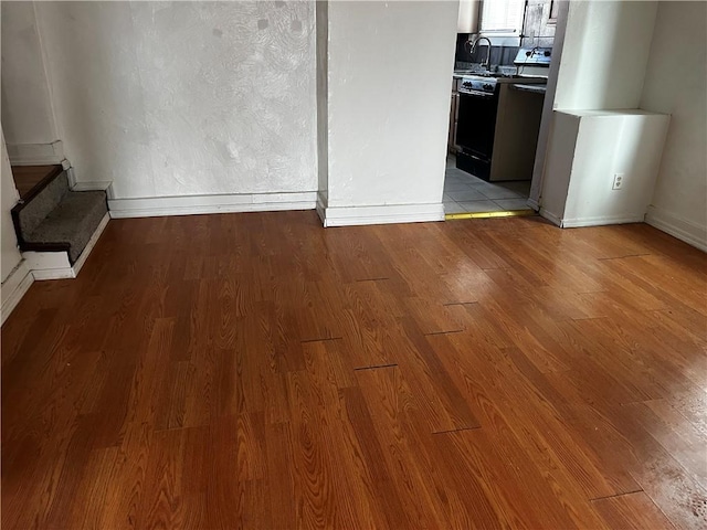 unfurnished living room with light hardwood / wood-style floors