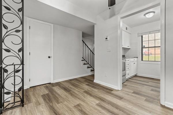 entryway with light hardwood / wood-style flooring