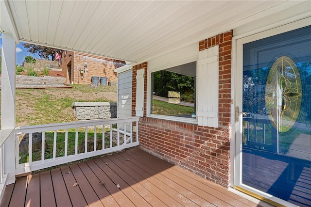 wooden terrace featuring a porch