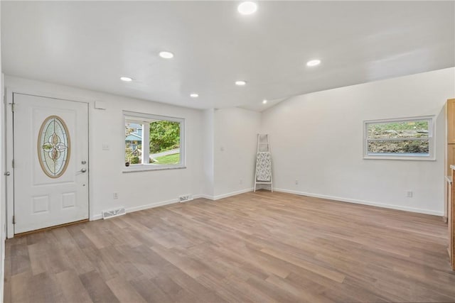 foyer entrance featuring light hardwood / wood-style flooring