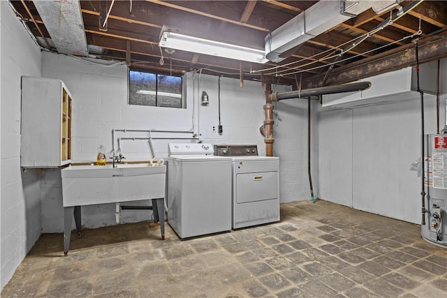 washroom featuring washer and dryer and water heater