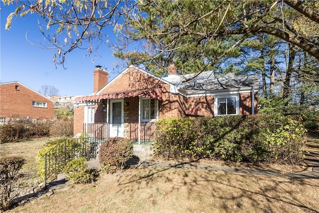 view of front of home with a front yard