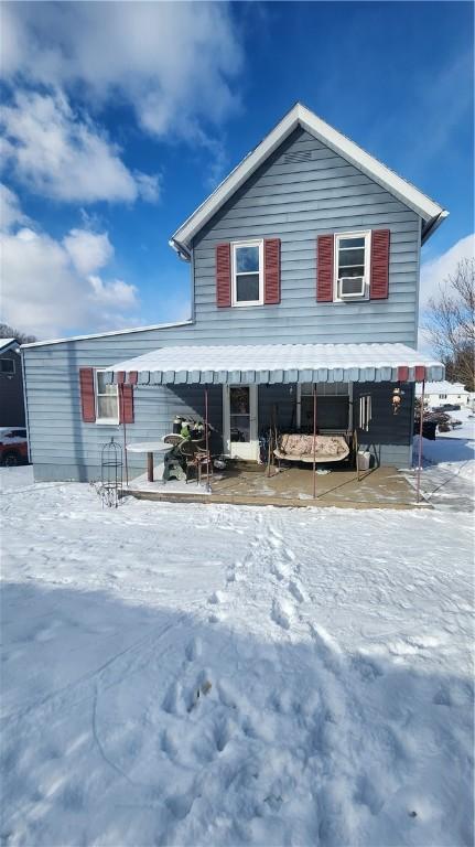 view of front of property with cooling unit